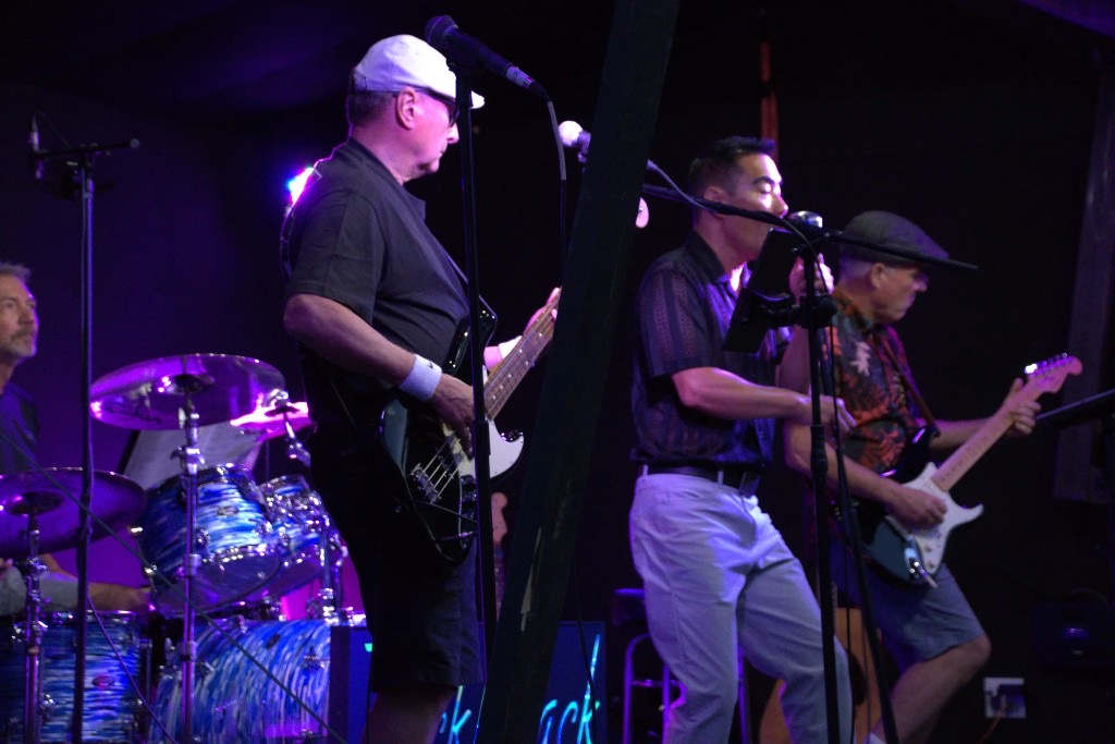 Pickleback under purple stage lights